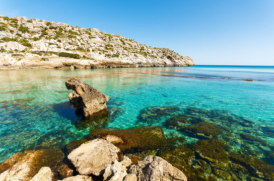 Turquoise water of Cala San Vicente beach, Majorca island, Spain