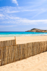 Fototapeta premium Wind fence on Cala Agulla beach, Majorca island, Spain