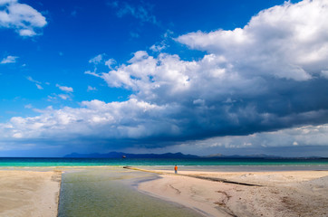 Fototapeta na wymiar Sea lagoon and sand dune on Alcudia beach, Majorca island, Spain