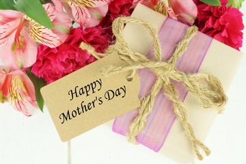 Gift box with Happy Mother's Day tag and pink flowers