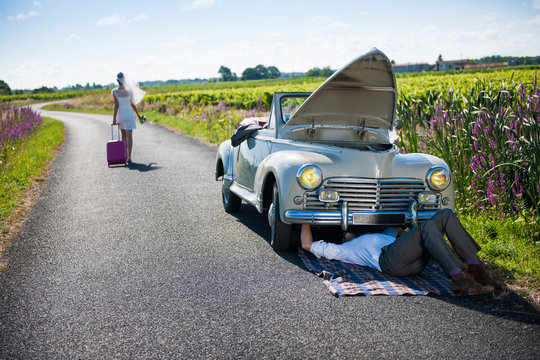 The newlyweds have a car breakdown.