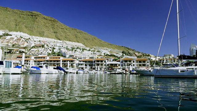 Yachts and boats in port or harbor in Los Gigantes