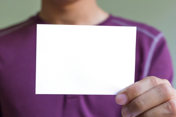 man holding blank white