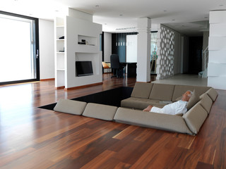 Portrait of senior man relaxing in sofa