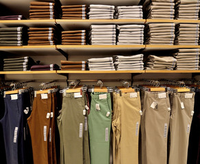 Pants on shelf in fashion store