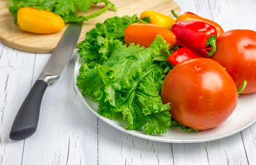 Fresh vegetables on the white plate