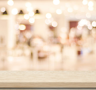 Empty table and blurred store bokeh background