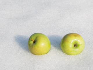 two bright green apple