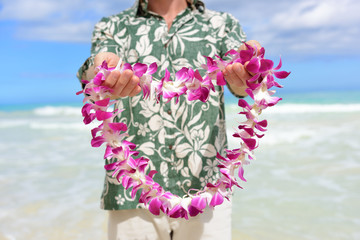 Hawaii tradition - giving a Hawaiian flowers lei
