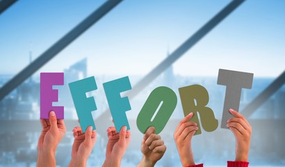 Composite image of hands holding up effort