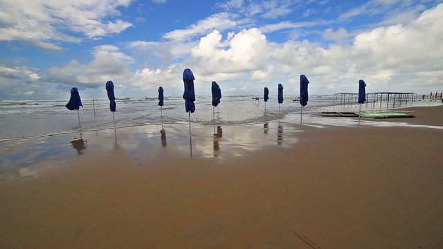 Sea coast beach wave tide surf seashore ocean umbrella