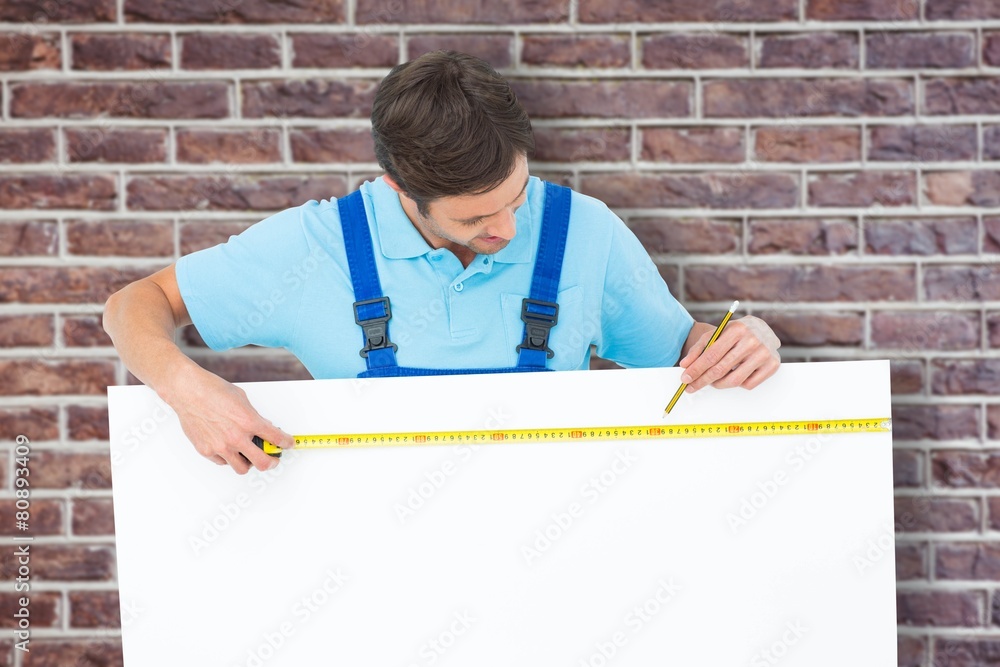 Poster composite image of carpenter measuring blank bill board