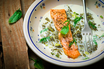 salmon with sauce from a sorrel.