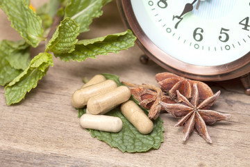 Time to eat Organic Herb capsule medicine