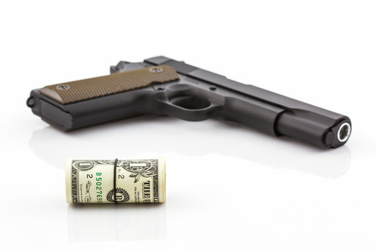 Close up money with Gun .