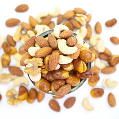 Close - up Mix of nuts on white background..