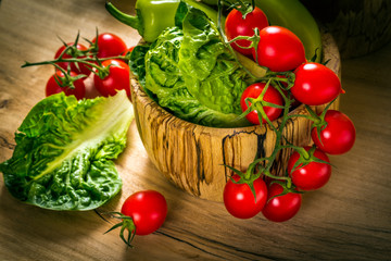 bunch of vegetables in the wooden bowl