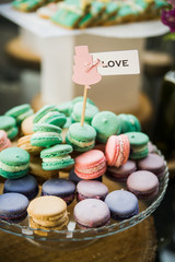 wedding dessert with delicious cakes and macaroons