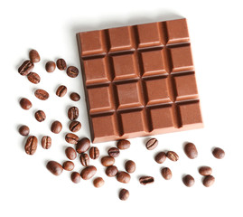 Milk chocolate bar with coffee beans isolated on white
