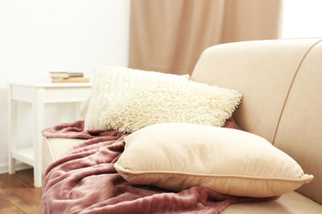 Interior design with pillows on sofa, closeup