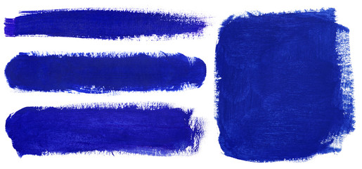 Fototapeta premium Blue strokes of gouache paint brush