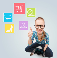 smiling woman with tablet pc computer at home