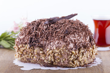 Whole Round Cake and Slice on Wood Table