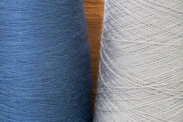grey and blue background from threads and yarns