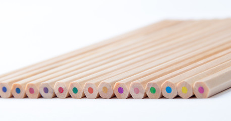 Colorful wooden pencils on white background