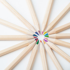 Colorful wooden pencils on white background