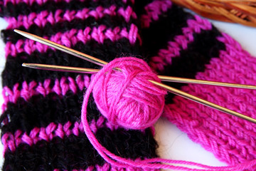 Ball of yarn and knitting needles.