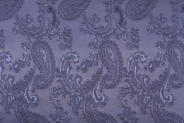 blue cloth with cucumbers