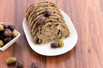 fresh baked olive bread slices