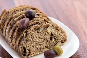 fresh baked olive bread slices