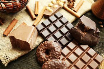 Still life with set of chocolate, nuts and spices