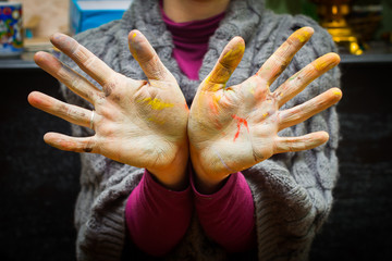 Hands stained with clay and paint. Hands painter and sculptor. C