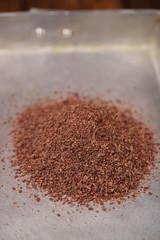 pile of grated dark 100% chocolate