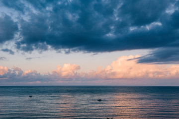 sunset over the sea of cumulus clouds