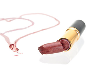 Broken heart lipstick isolated on white background
