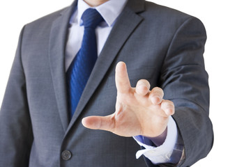 Businessman pointing at something isolated on white © Svilen Georgiev