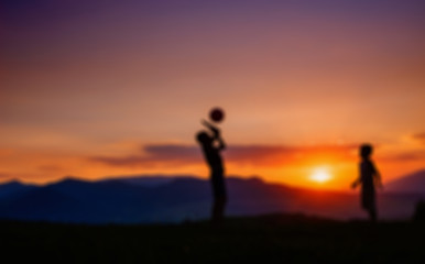 Fototapeta na wymiar Children at sunset