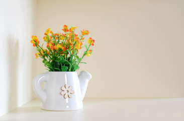 Artificial flowers in a vase