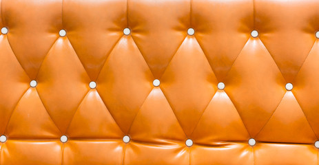 Abstract orange  leather sofa  background ,  leather background,
