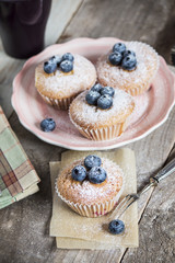 Homemade blueberry muffin with berries for a snack