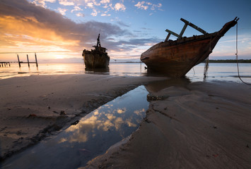 Old wrecked ship at sunrise in Kuala Penyu,Sabah Borneo,Malaysia