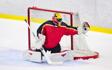 Ice Hockey - Goalie catches the puck © RobertNyholm