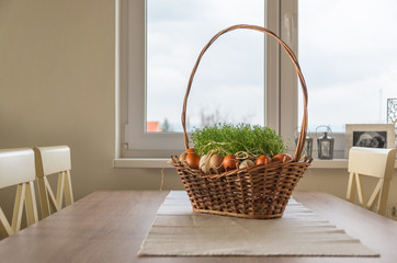 Fototapeta na wymiar Easter basket decoration on the table