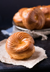 Choux pastry eclair ring with custard cream