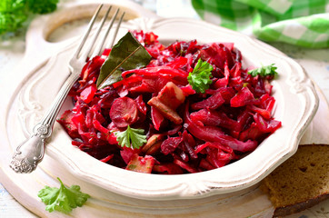 Beetroot and cabbage stewed with sausage and smoked bacon.