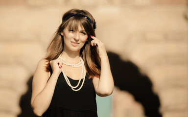 Flapper girl woman in1920s style portrait outdoor